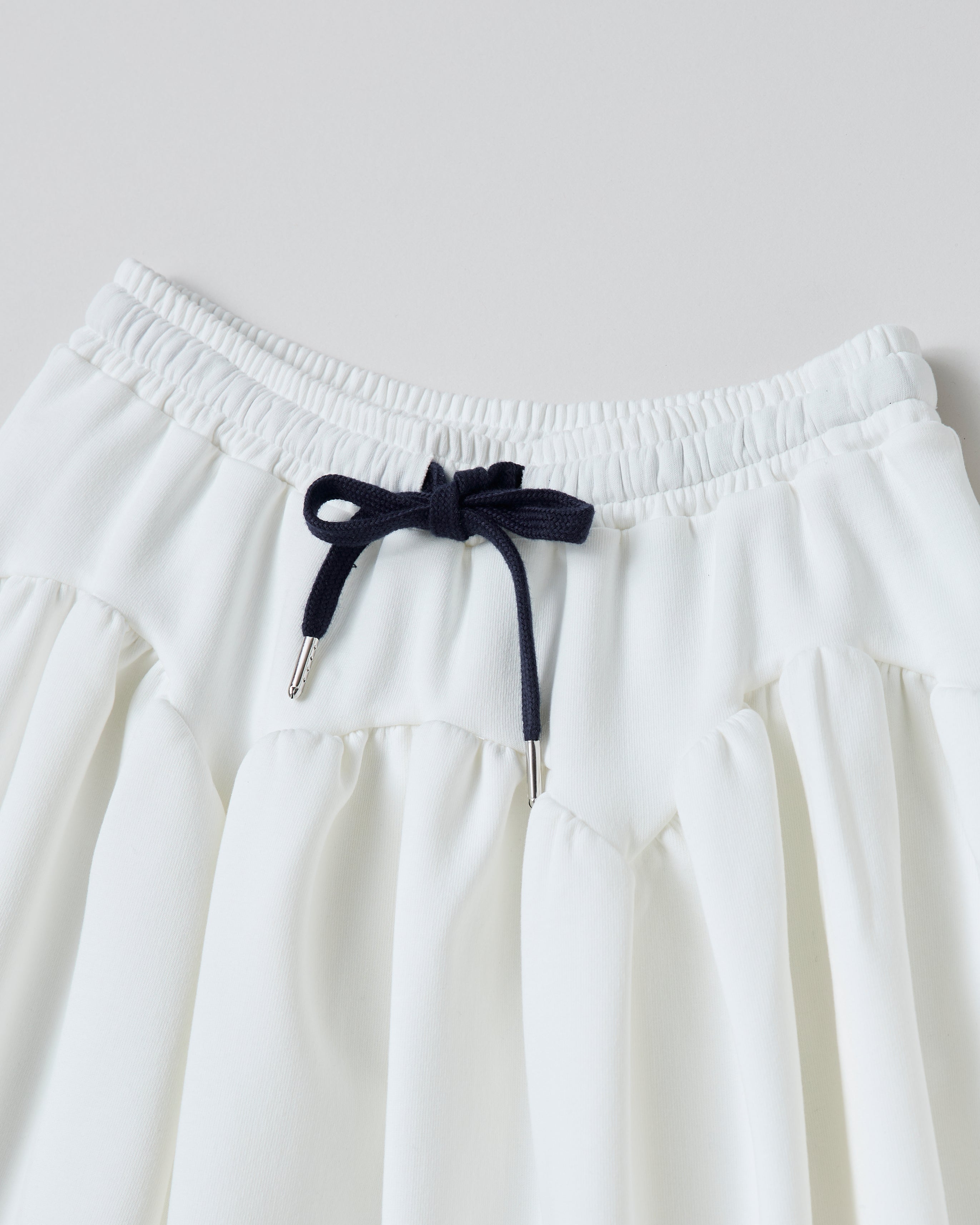 Arch gathered flare mini skirt (white)