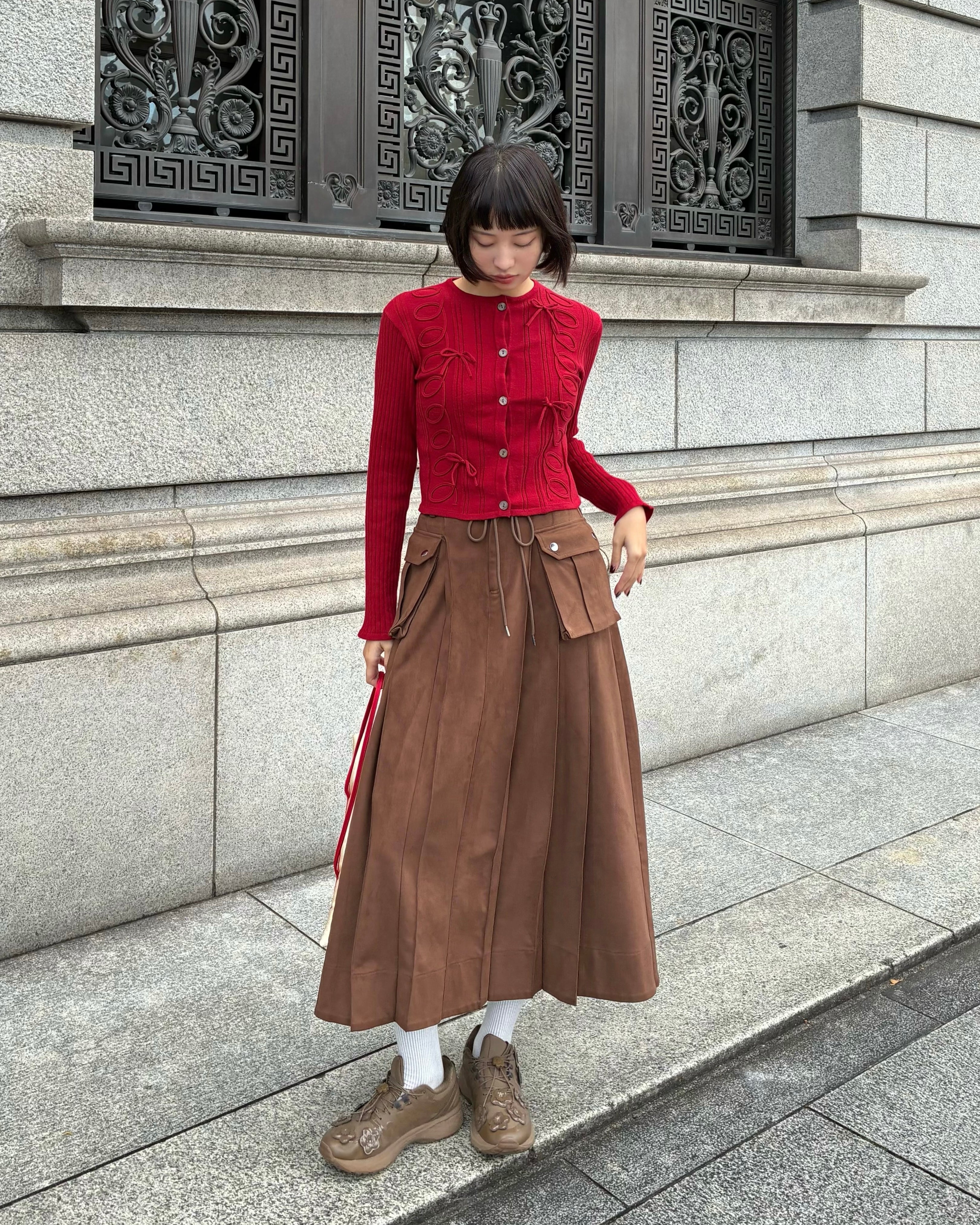 Suede-like pleated long skirt