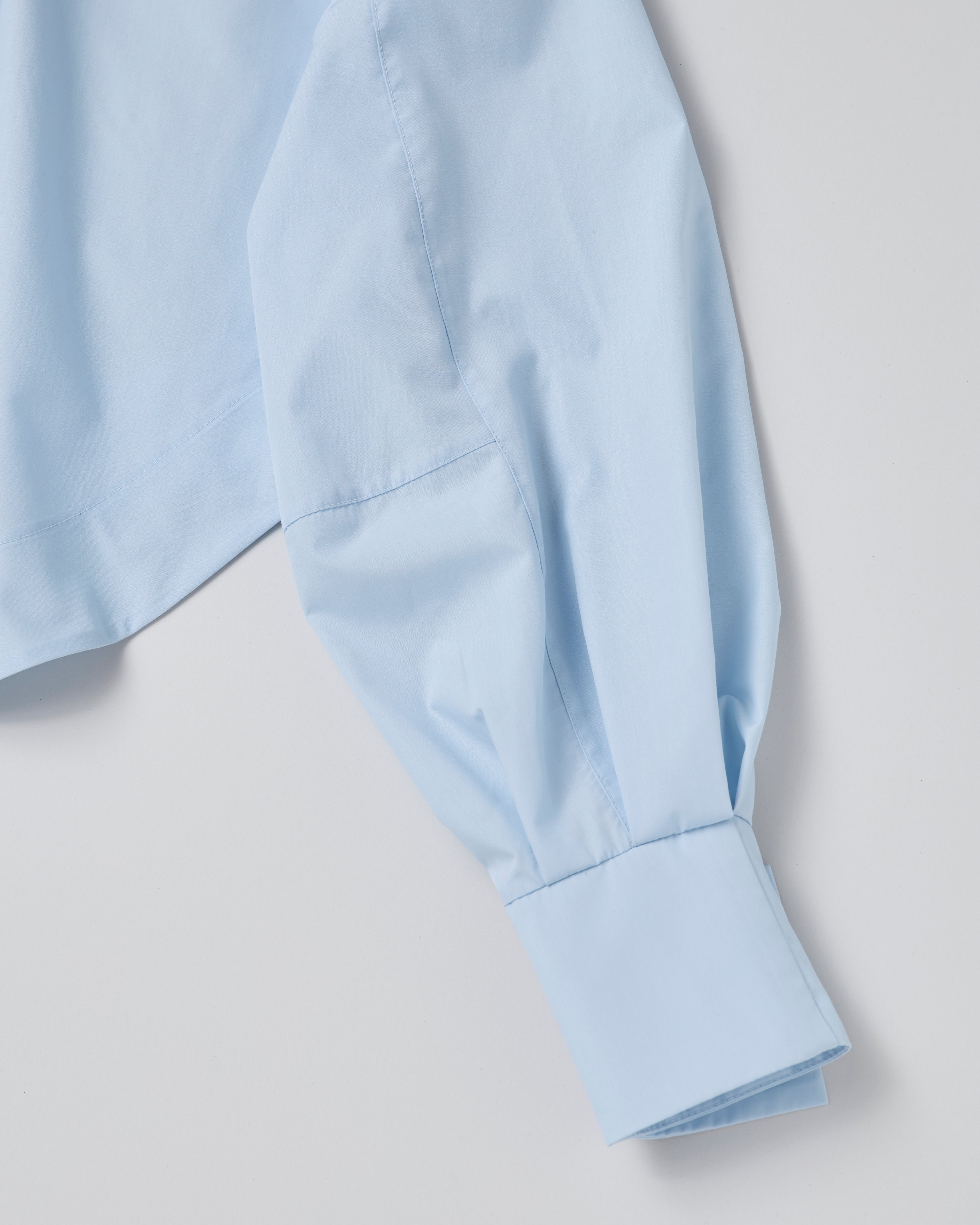 Curved hemline short shirt (light blue)