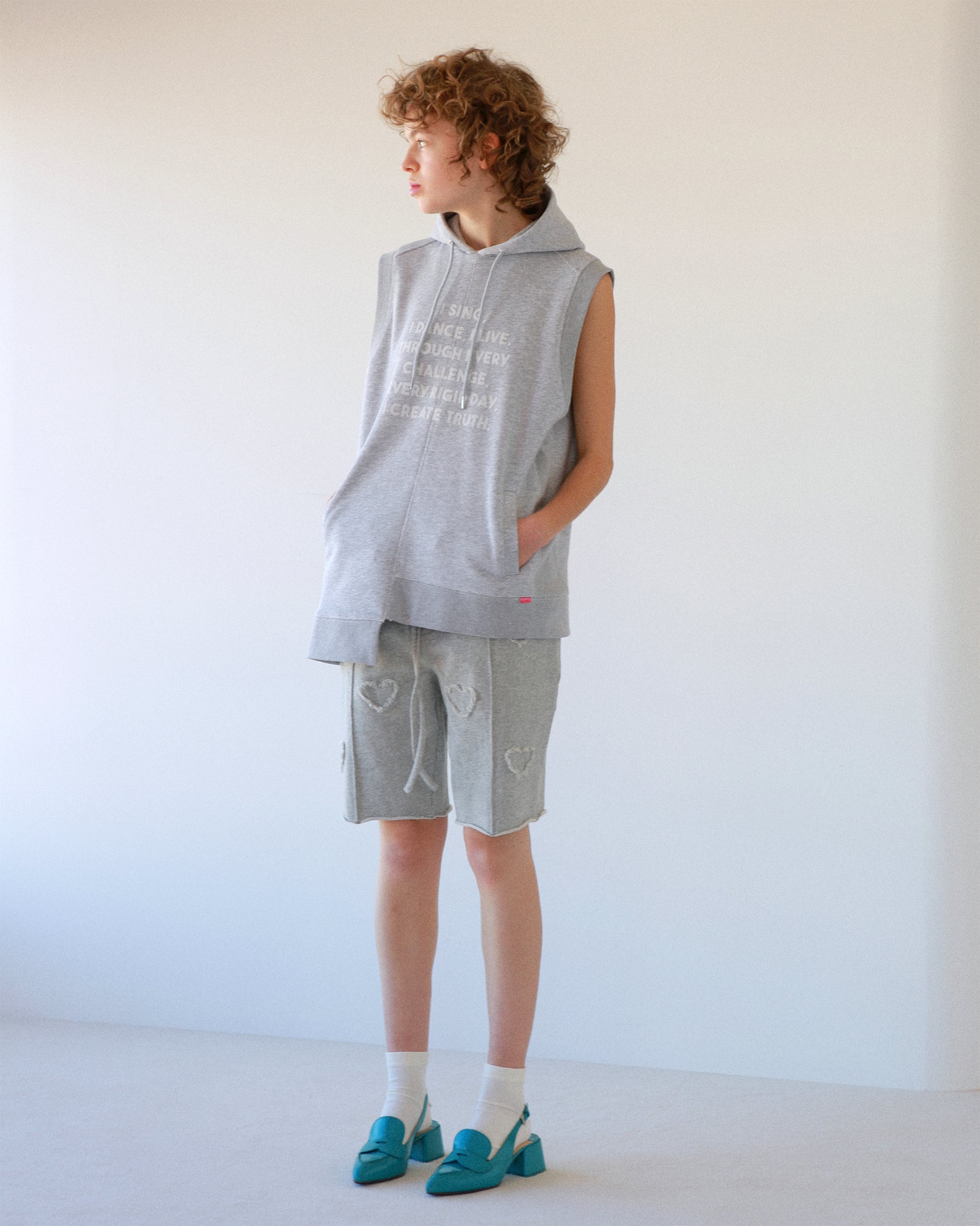 Flocky asymmetric hoodie vest