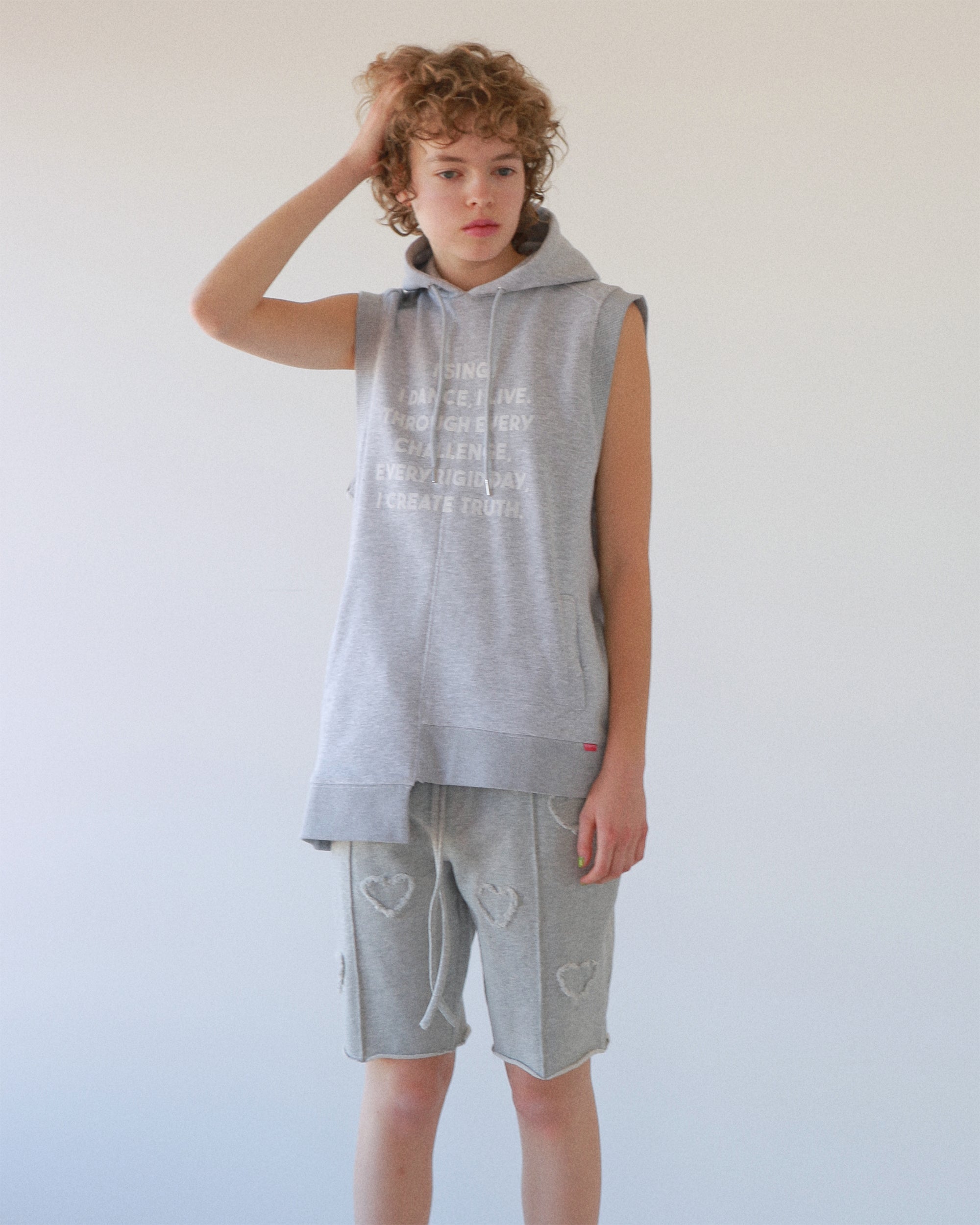 Flocky asymmetric hoodie vest
