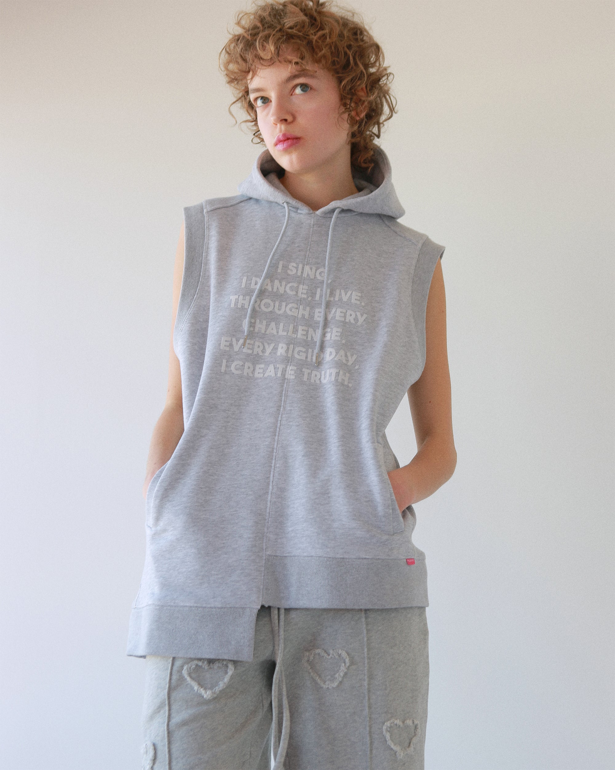 Flocky asymmetric hoodie vest