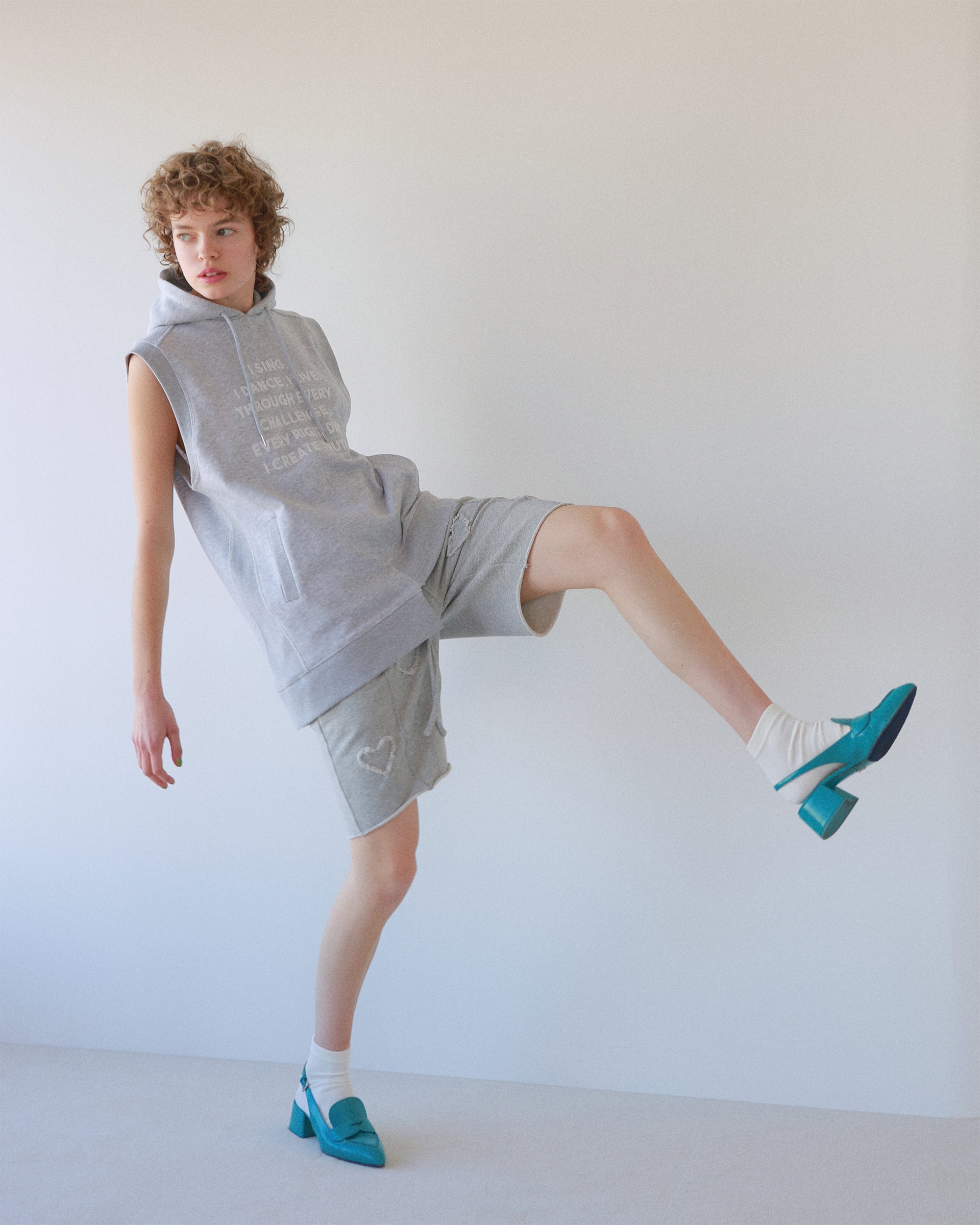 Flocky asymmetric hoodie vest