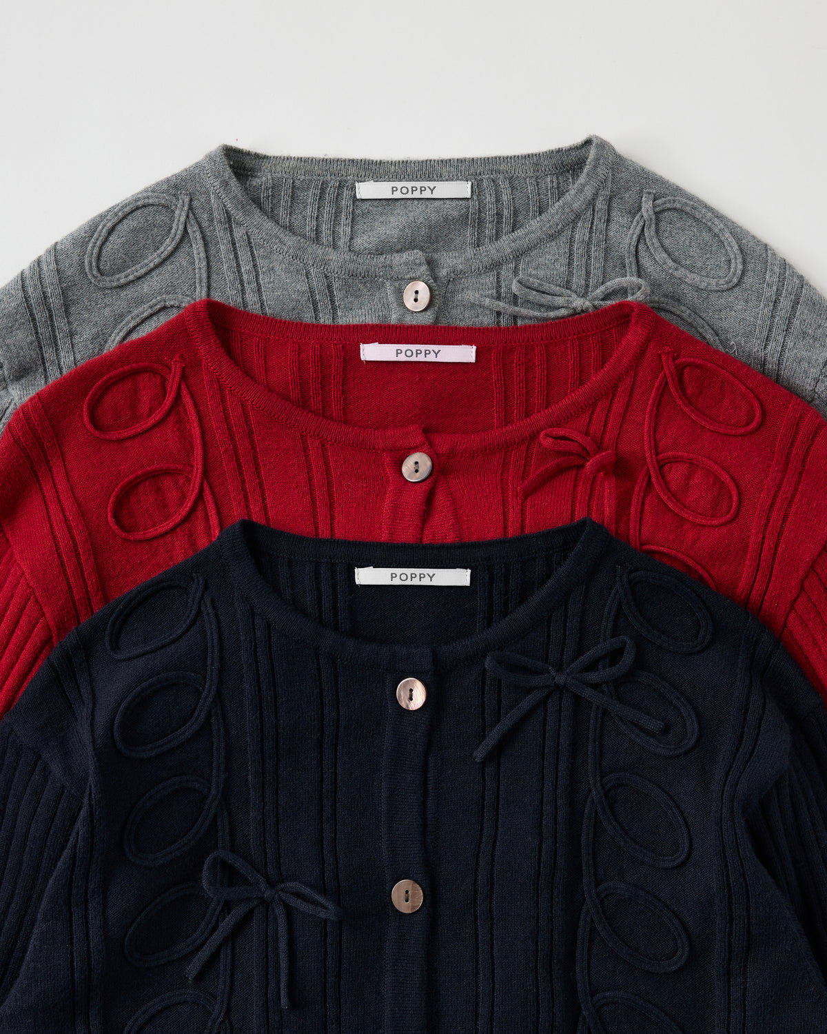 Kurukuru ribbon rib knit cardigan