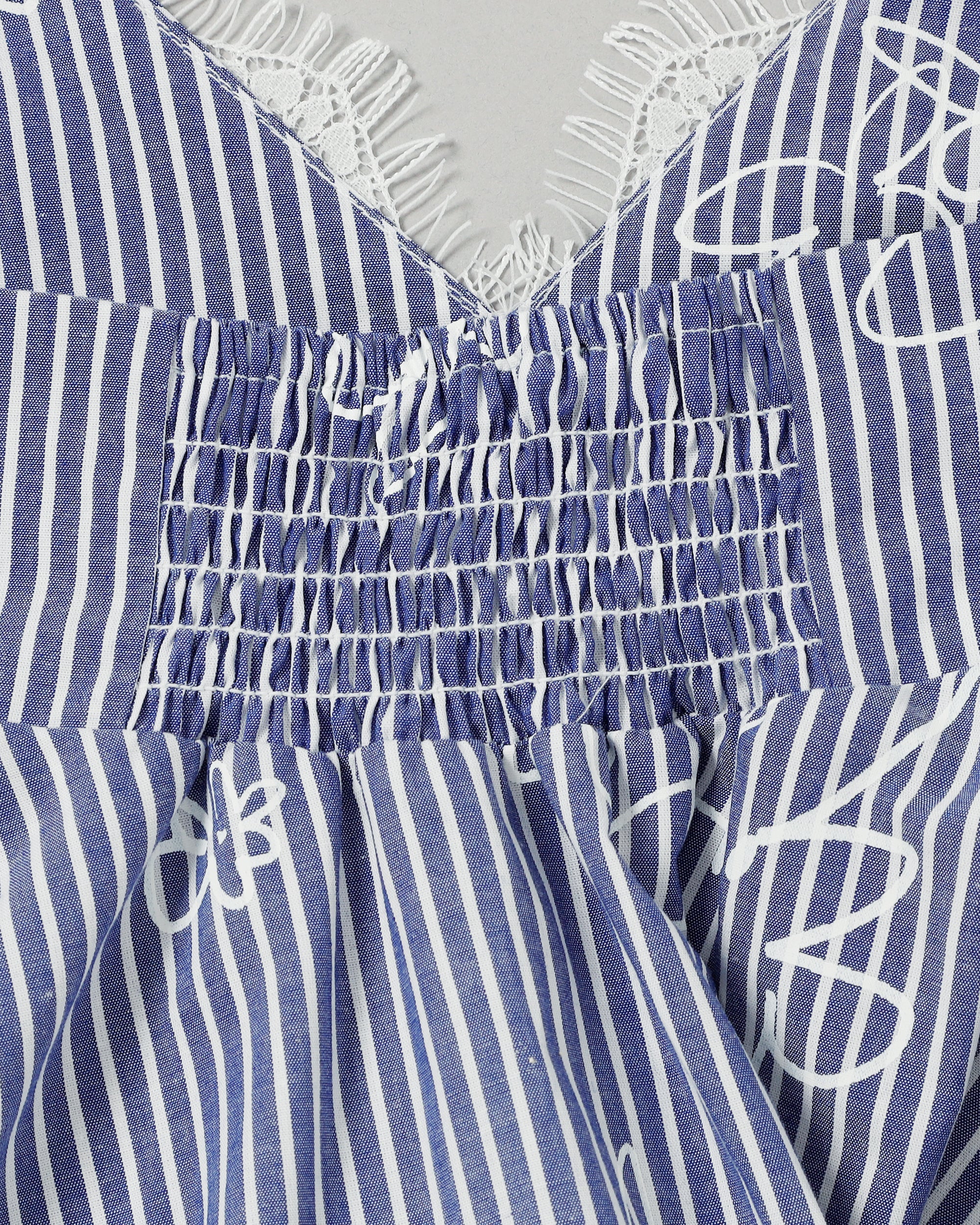 POPPYハンカチーフヘムチュニック 青ストライプ花柄 フリーサイズ Handkerchief hem tunic (blue stripe flower)